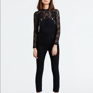 Levi’s black overalls